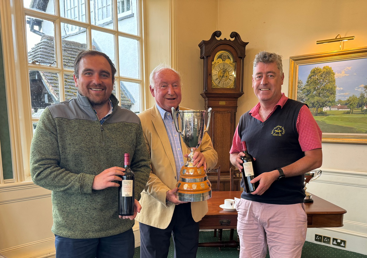 greensomes winners receive jubilee trophy